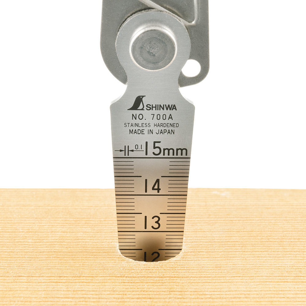 Coin de mesure Shinwa® avec protection métallique et clip