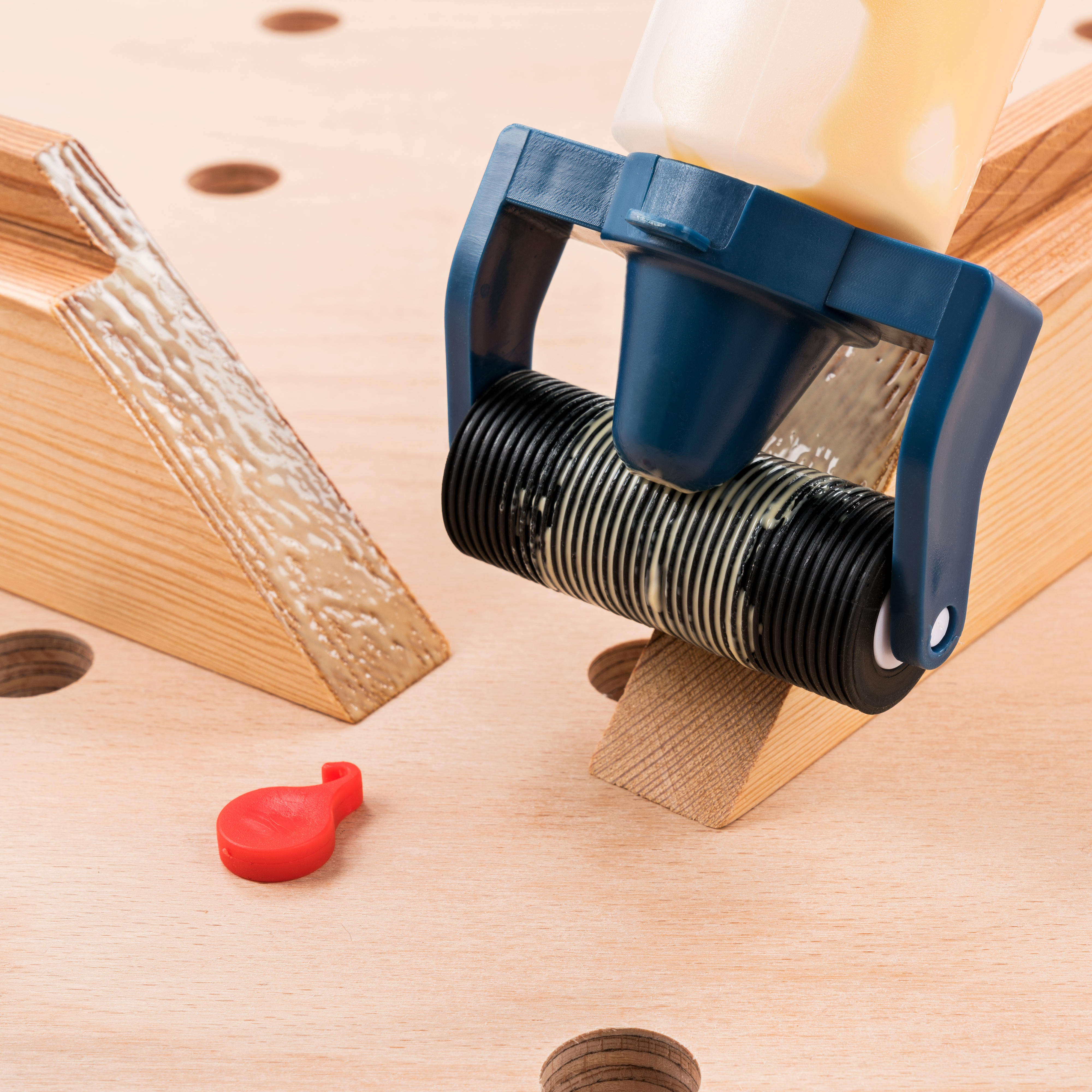 Flacone applicatore con rullo per colla