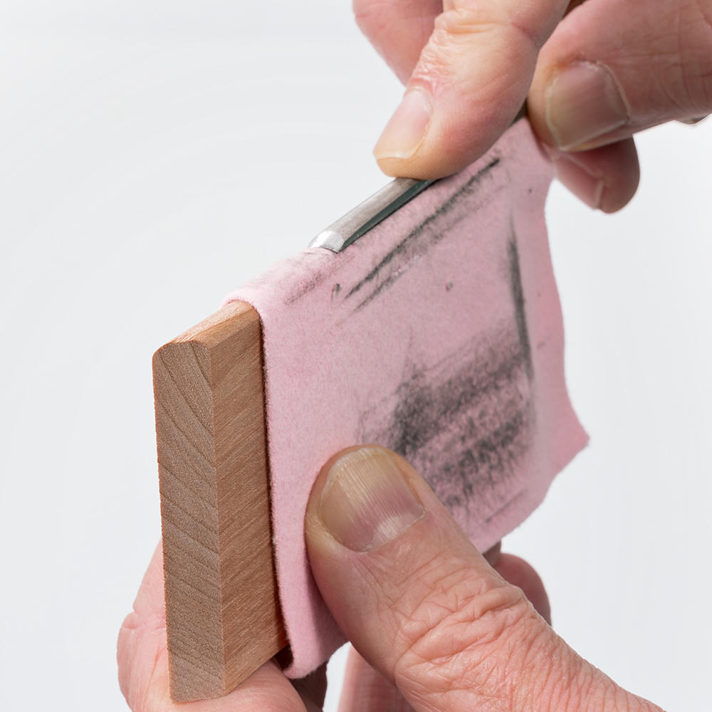 Guida per affilatura per sgorbie da intaglio e sgorbie palmari